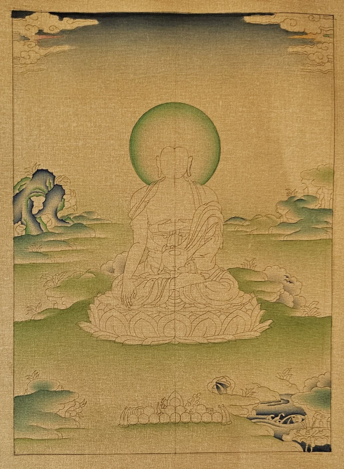 First colour washes laid into the landscape and halo while the figure remains uncoloured