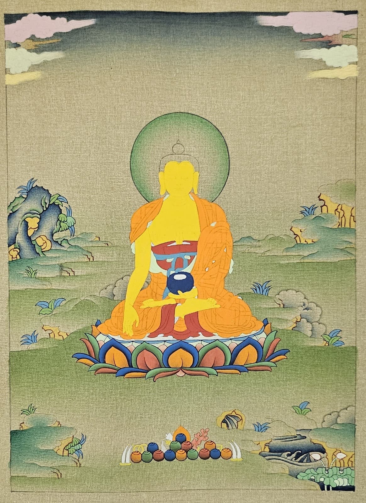 The Buddha blocked in with flat mineral colour, face still unpainted